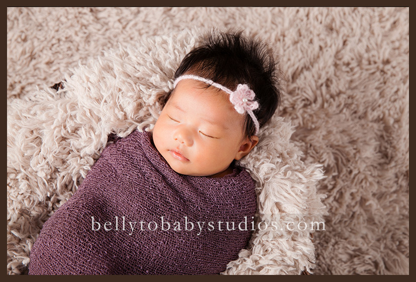 Why hire a professional newborn photographer and what to look for.