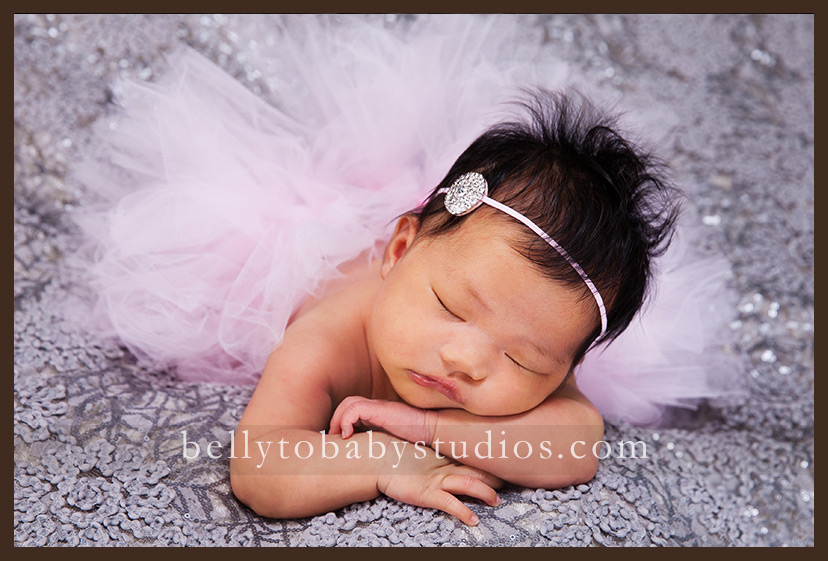 Why hire a professional newborn photographer and what to look for. 