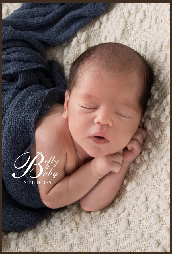 Houston Maternity Photographer Houston newborn portrait artwork created to become a treasured family heirloom.
