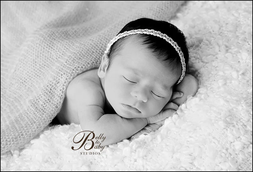 Houston Maternity Photographer When to Schedule Newborn Photography Sessions in Houston - Sleeping newborn baby portrait photographed in Houston