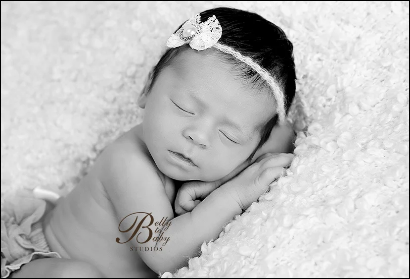 Houston Maternity Photographer Peacefully sleeping newborn portrait photographed in Houston studio